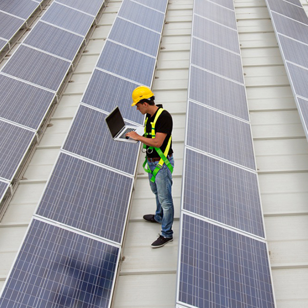 Engineer Monitoring Solar Power